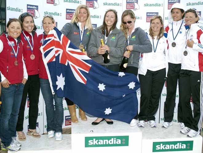 Olivia Price (AUS), Claire Leroy (FRE), Anna Tunnicliffe (USA) and teams receive awards on Day 6 of the Skandia Sail for Gold Regatta, in Weymouth and Portland, the 2012 Olympic venue. © onEdition http://www.onEdition.com